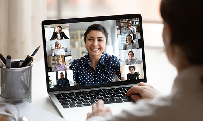 Women on video call with co-workers