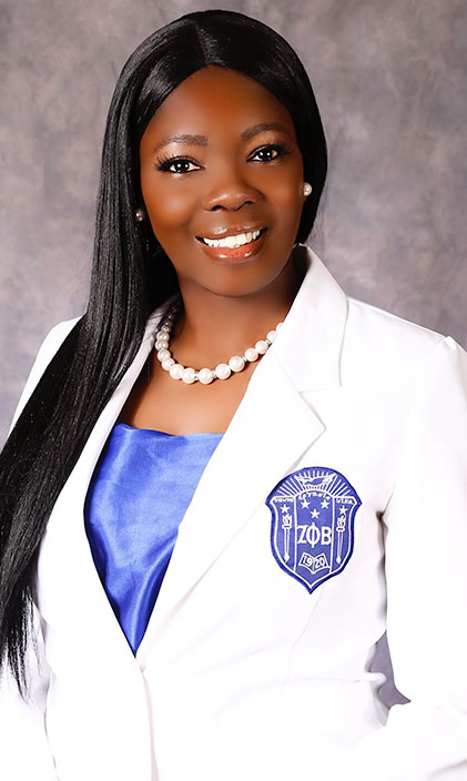 Portrait of Natasha Sunday Clarke in her sorority blazer