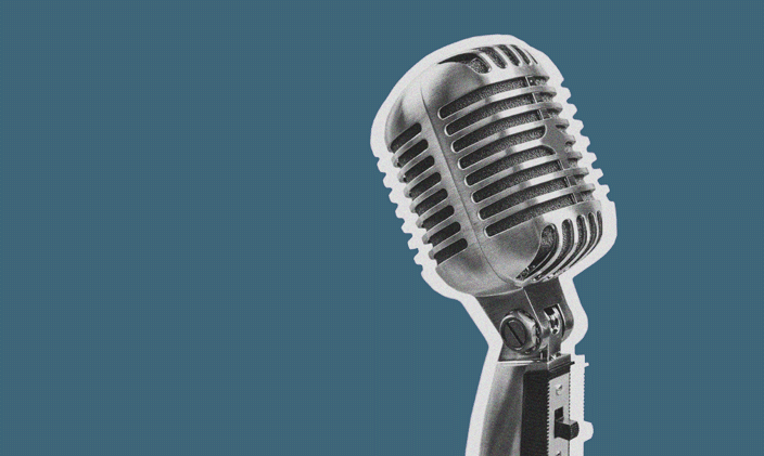 A silver microphone on a stand against a teal background.