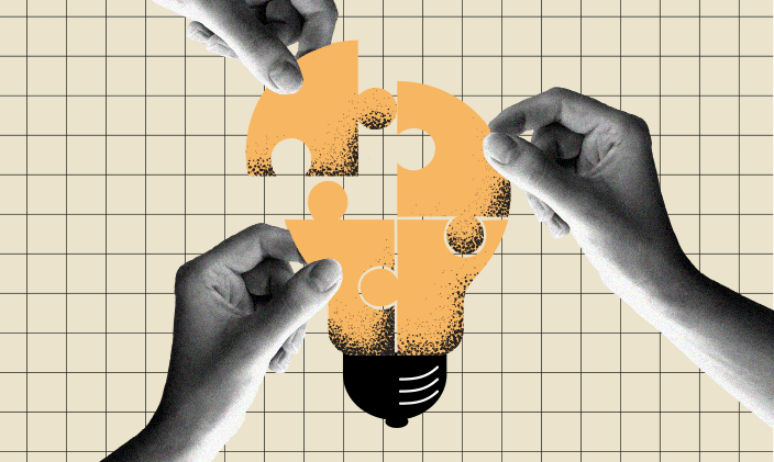 Three hands placing pieces of a puzzle together to form a light bulb.
