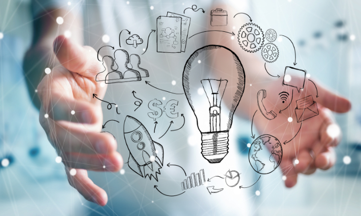 An illustration showing two hands orchestrating ideas
